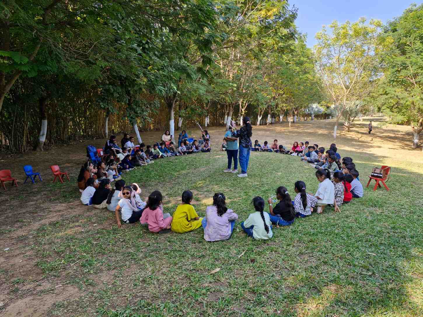 Students learning about nature in an outdoor educational workshop