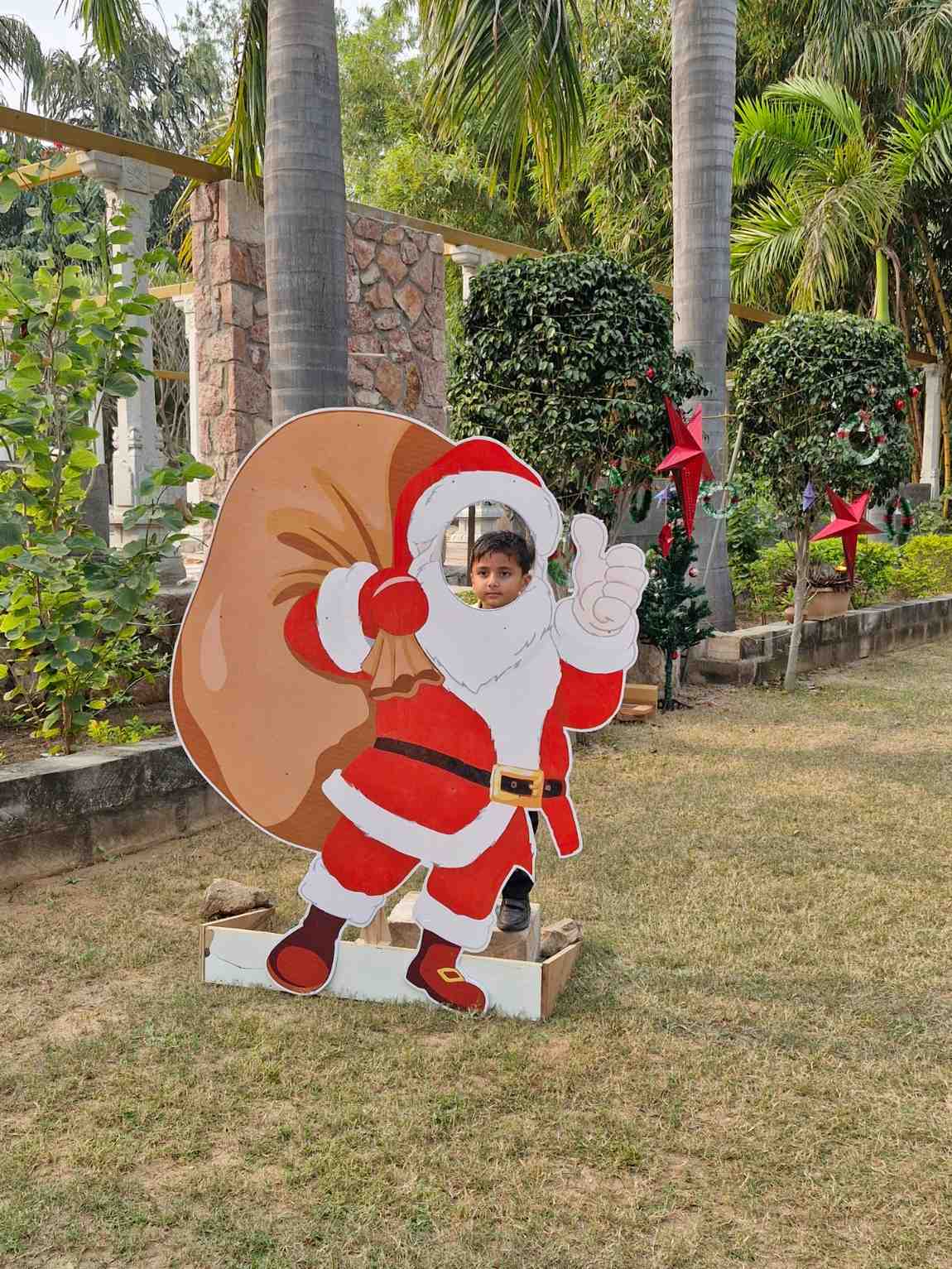 Child enjoying Christmas festivities at school campsite