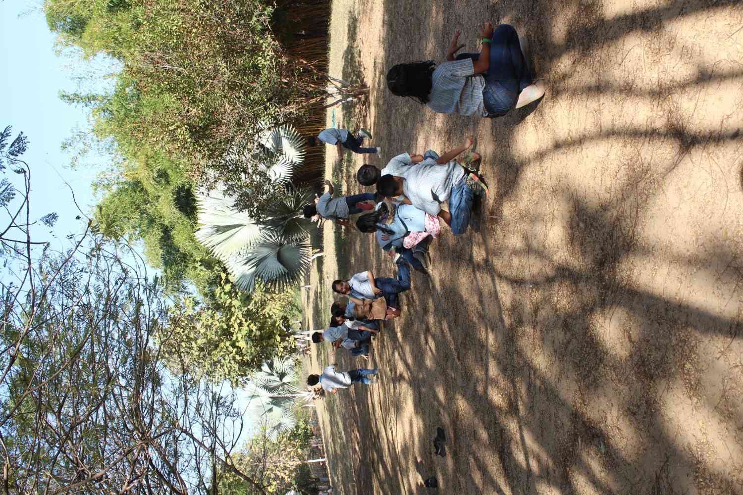 Students sitting and relaxing in nature park