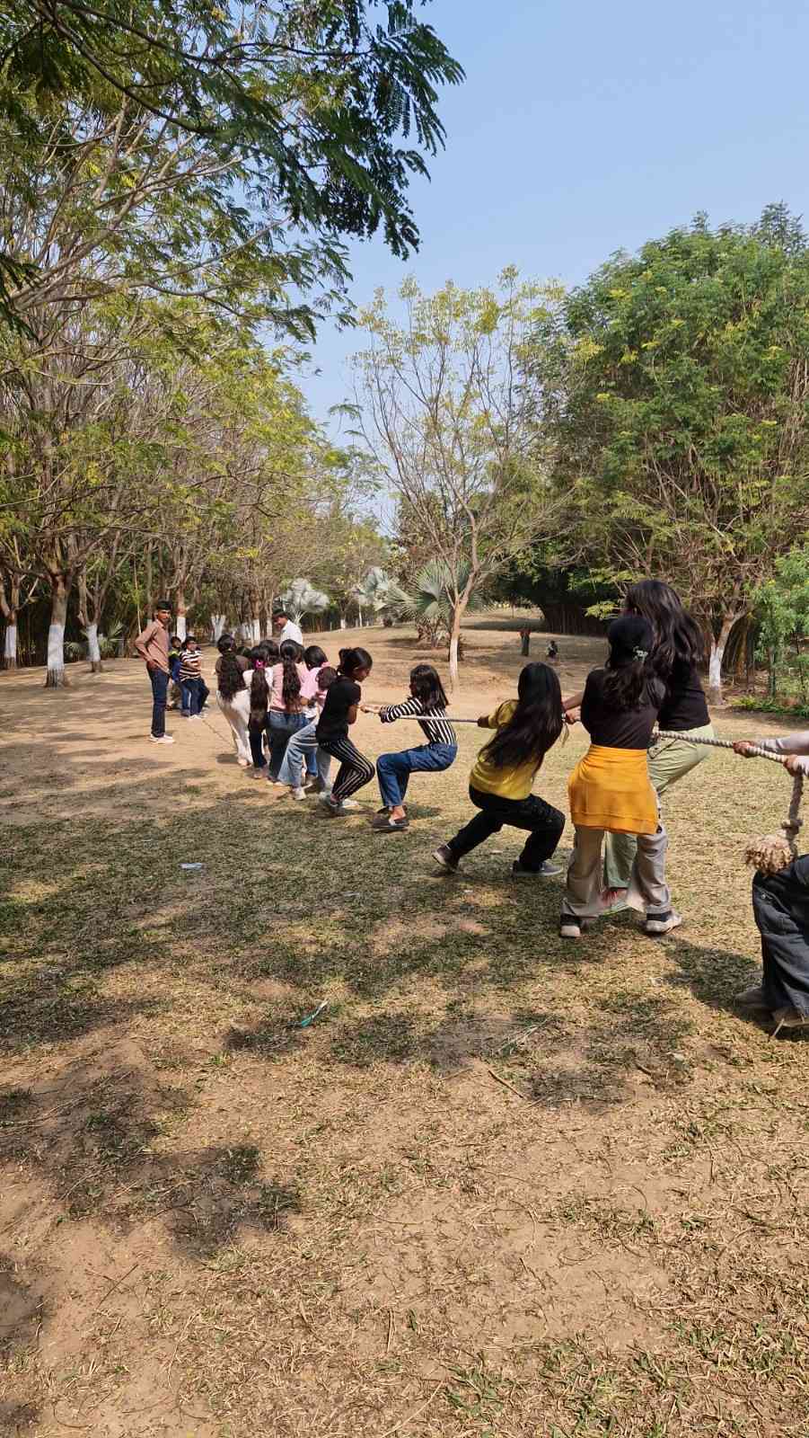 Girls playing tug of war