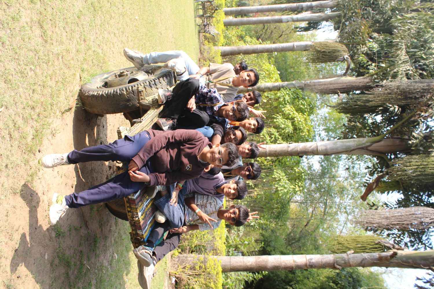 Group photo on vintage tractor
