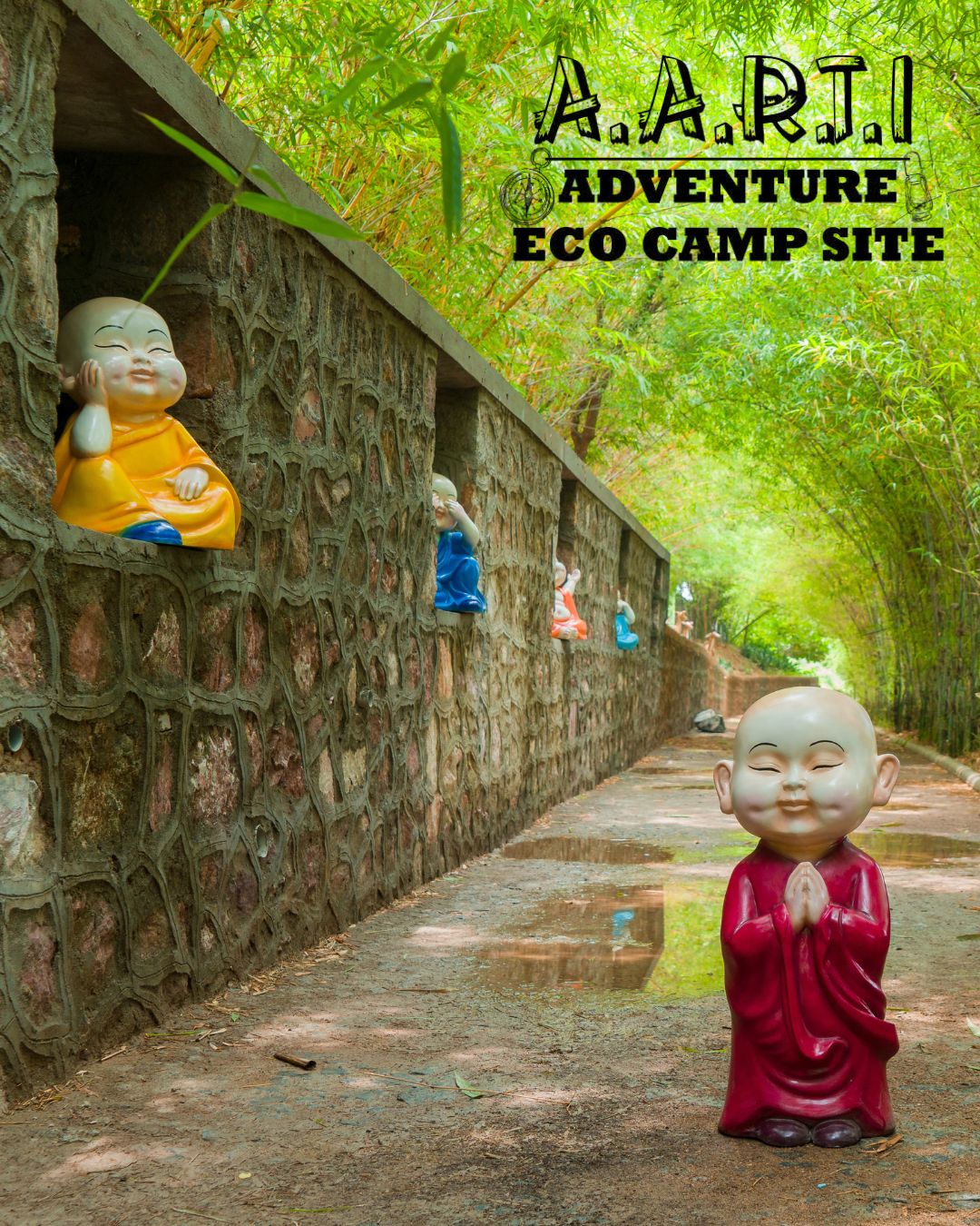 Little monk statue praying at Aarti Adventure Eco Camp Site entrance